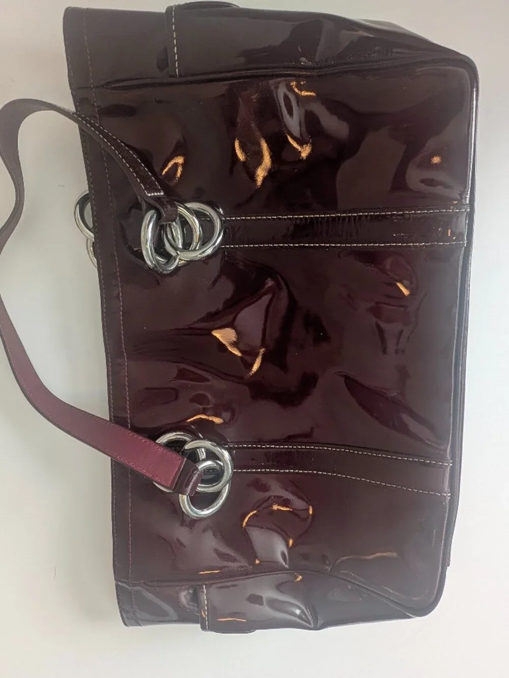 Coach Plum/Burgundy patent leather handbag